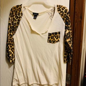 Cream colored, animal print sleeve, rue 21 top